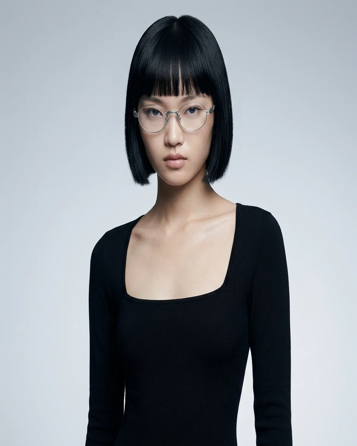 Model wearing Filigree Oval