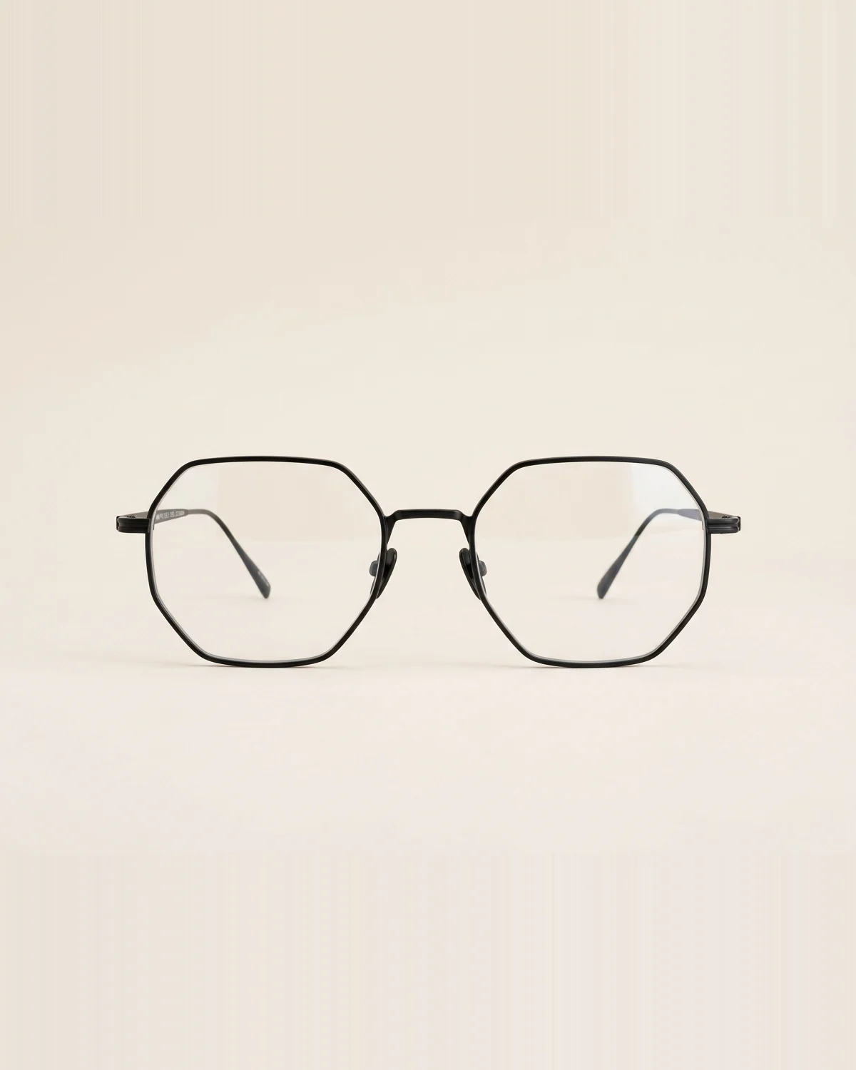Steel Octagon in Matte Black Steel with Clear lenses